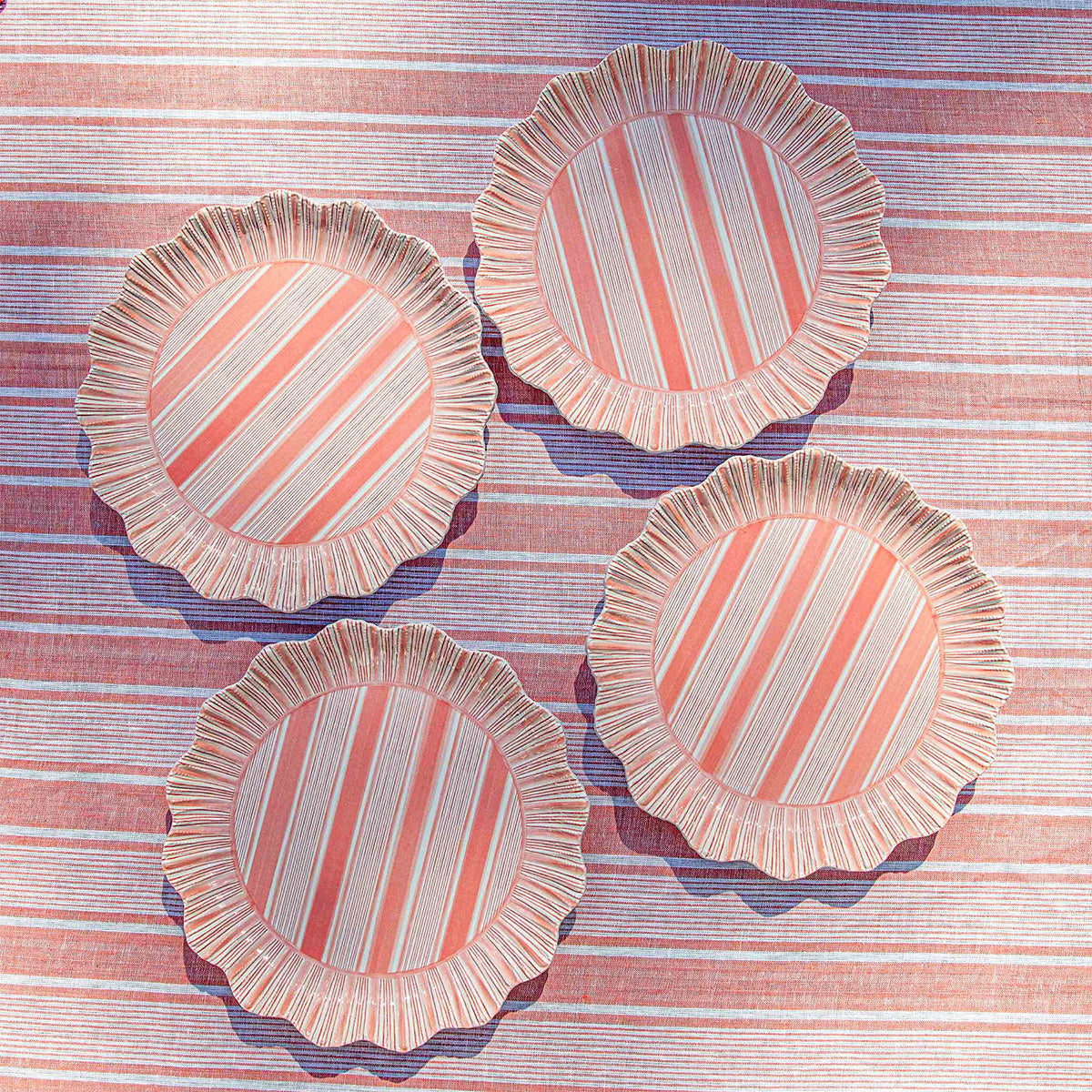 An image of Juliska Cabana Stripe Melamine Dinner Plate Assorted Set of 4 - Multi