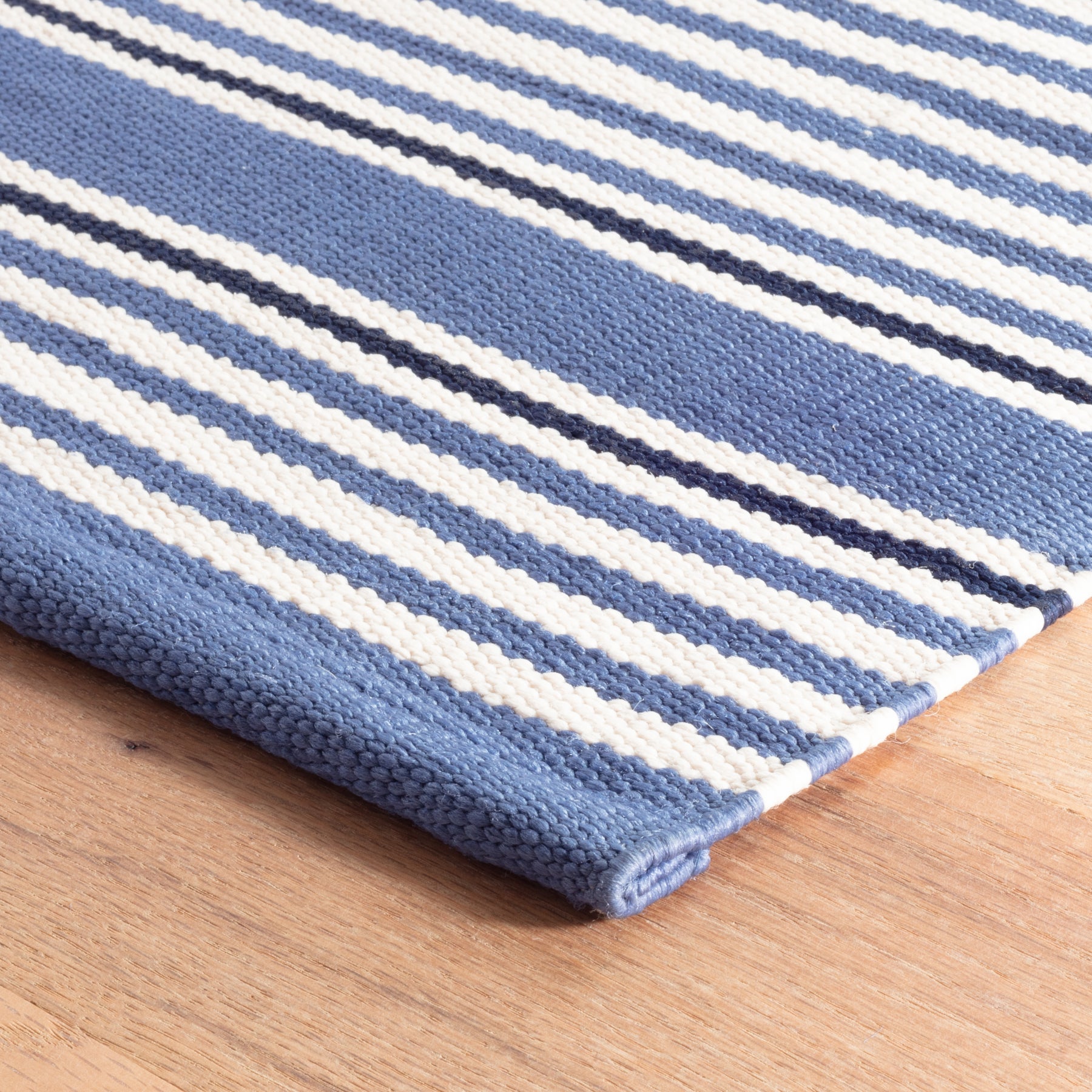An image of Dash & Albert Rugby Stripe Denim Indoor/Outdoor Rug