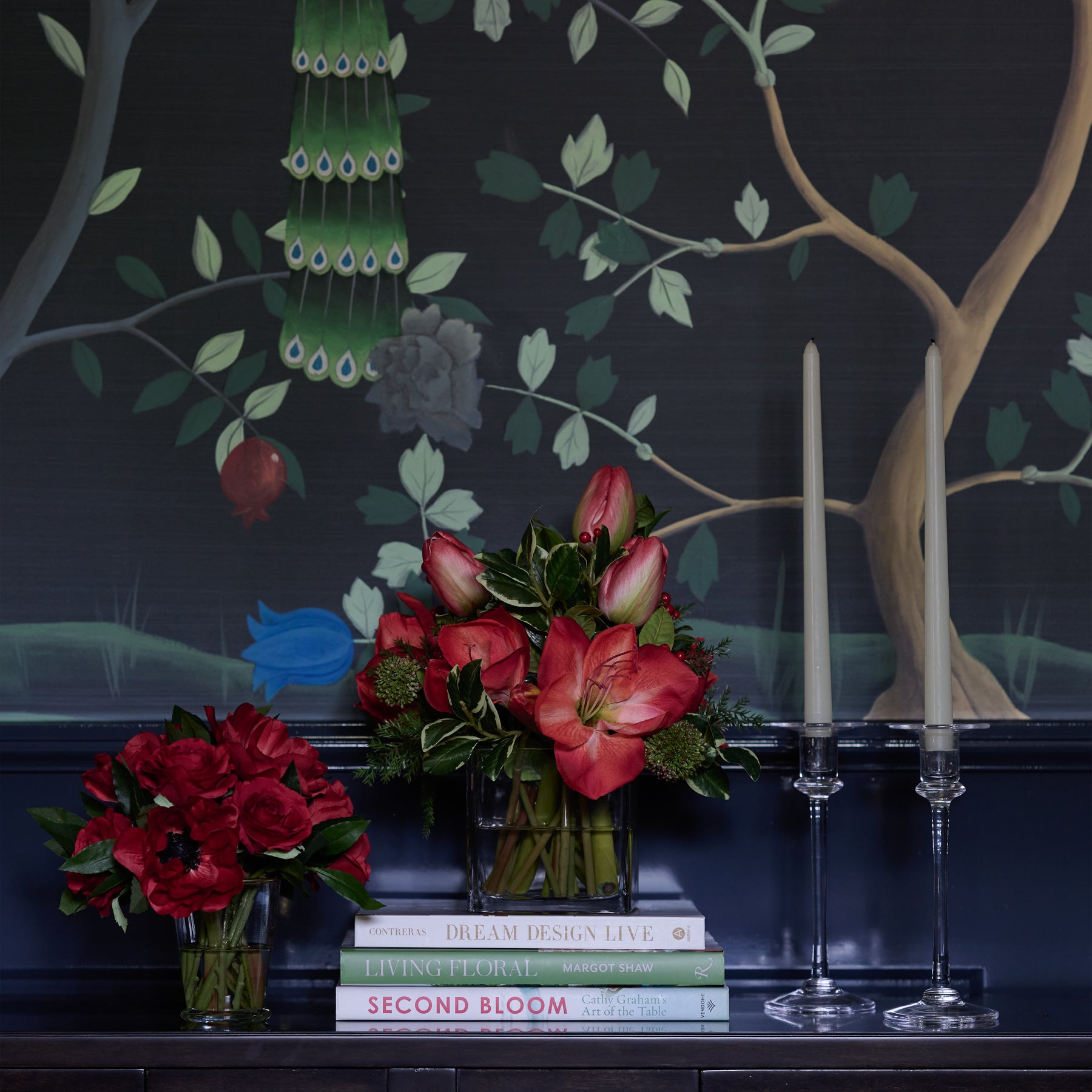 An image of Diane James Red Amaryllis & Holly Bouquet in Vase
