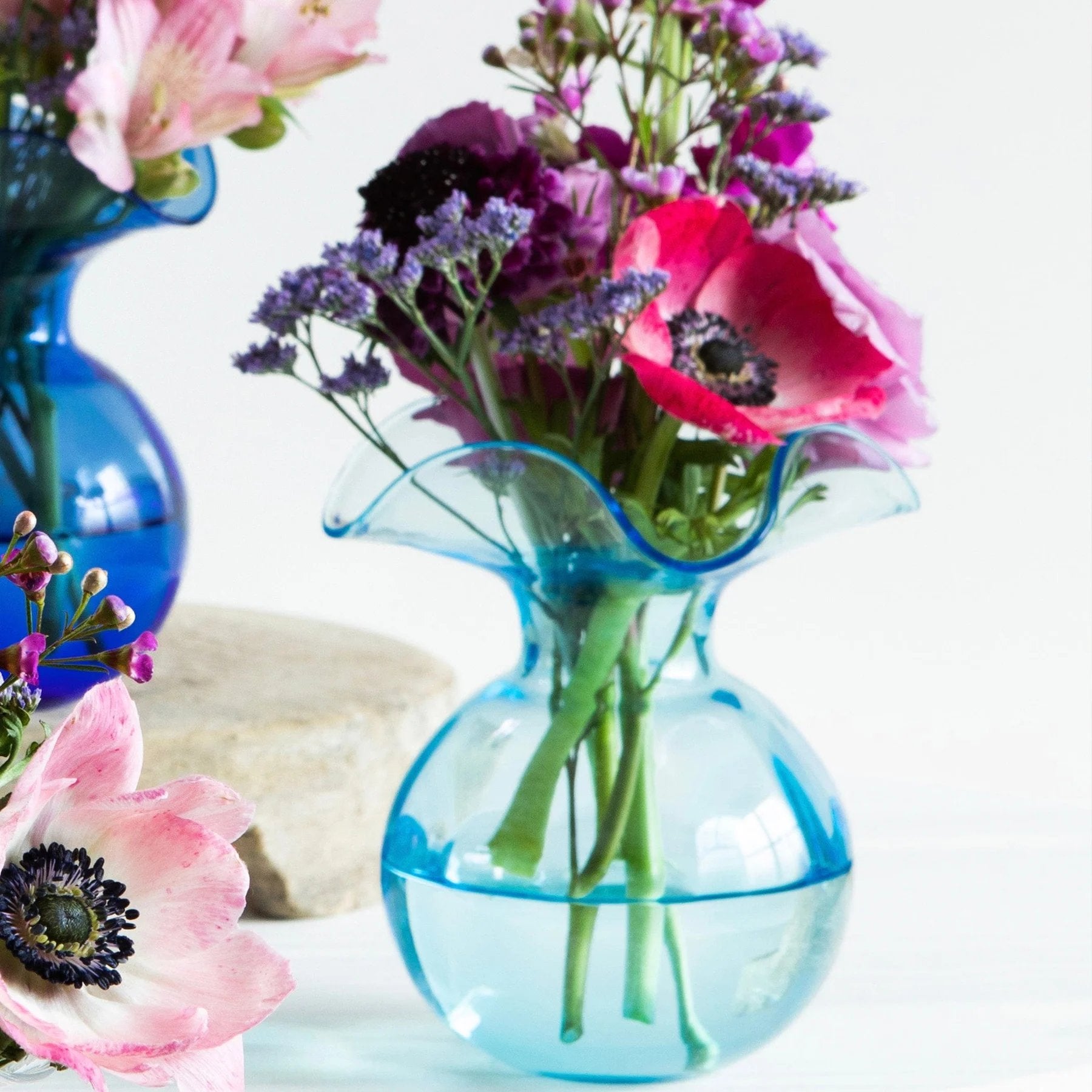 An image of Vietri Hibiscus Glass Bud Vase