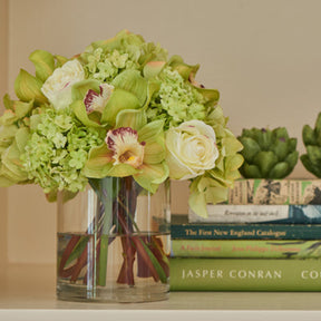 Diane James Hydrangea and orchid bouquet in glass cylinder - 10"d x 10"h
