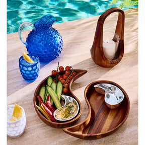 Mario Luca Sister Rosetta Blue Pitcher by the pool with food on wood trays