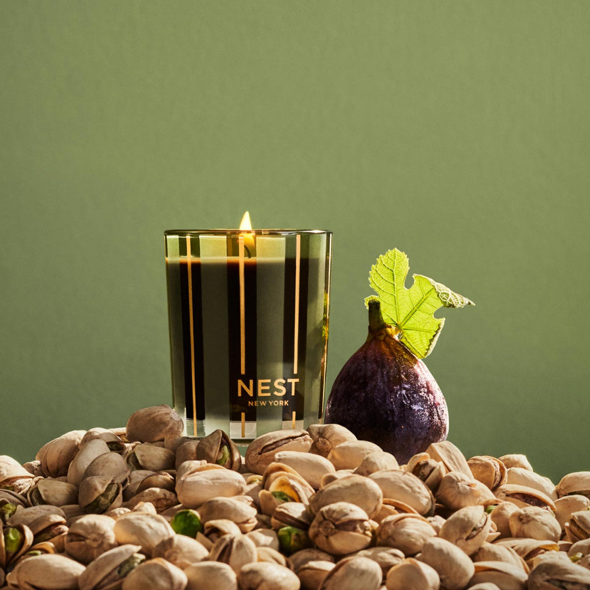 An image of Nest Fragrances Pistachio & Wild Fig Votive Candle 2 oz