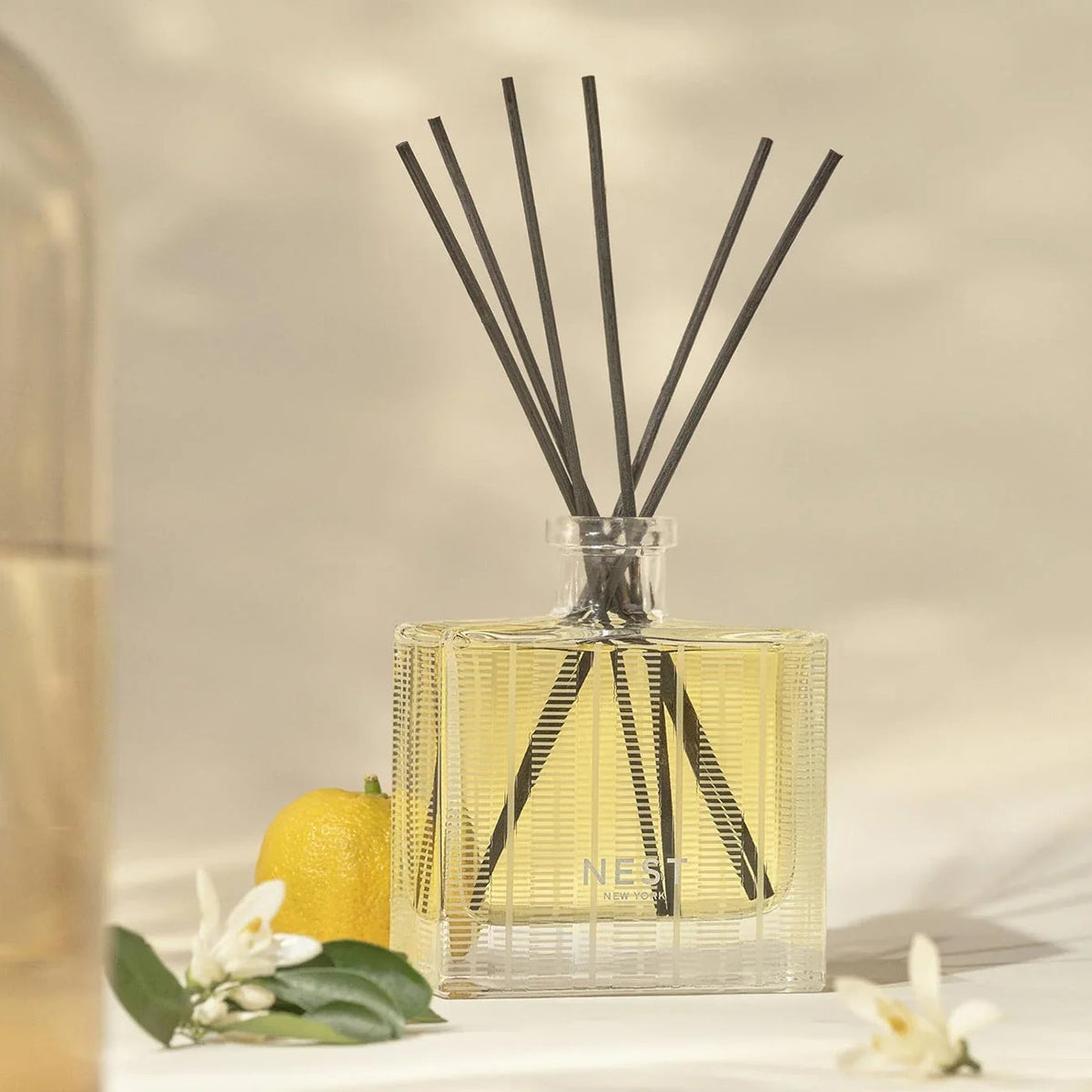 An image of Nest Fragrances Sunlit Yuzu & Neroli Reed Diffuser 5.9 fl oz
