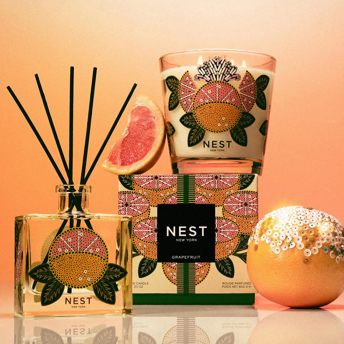 An image of Nest Fragrances Grapefruit Decorative 3-Wick Candle 21.2 oz