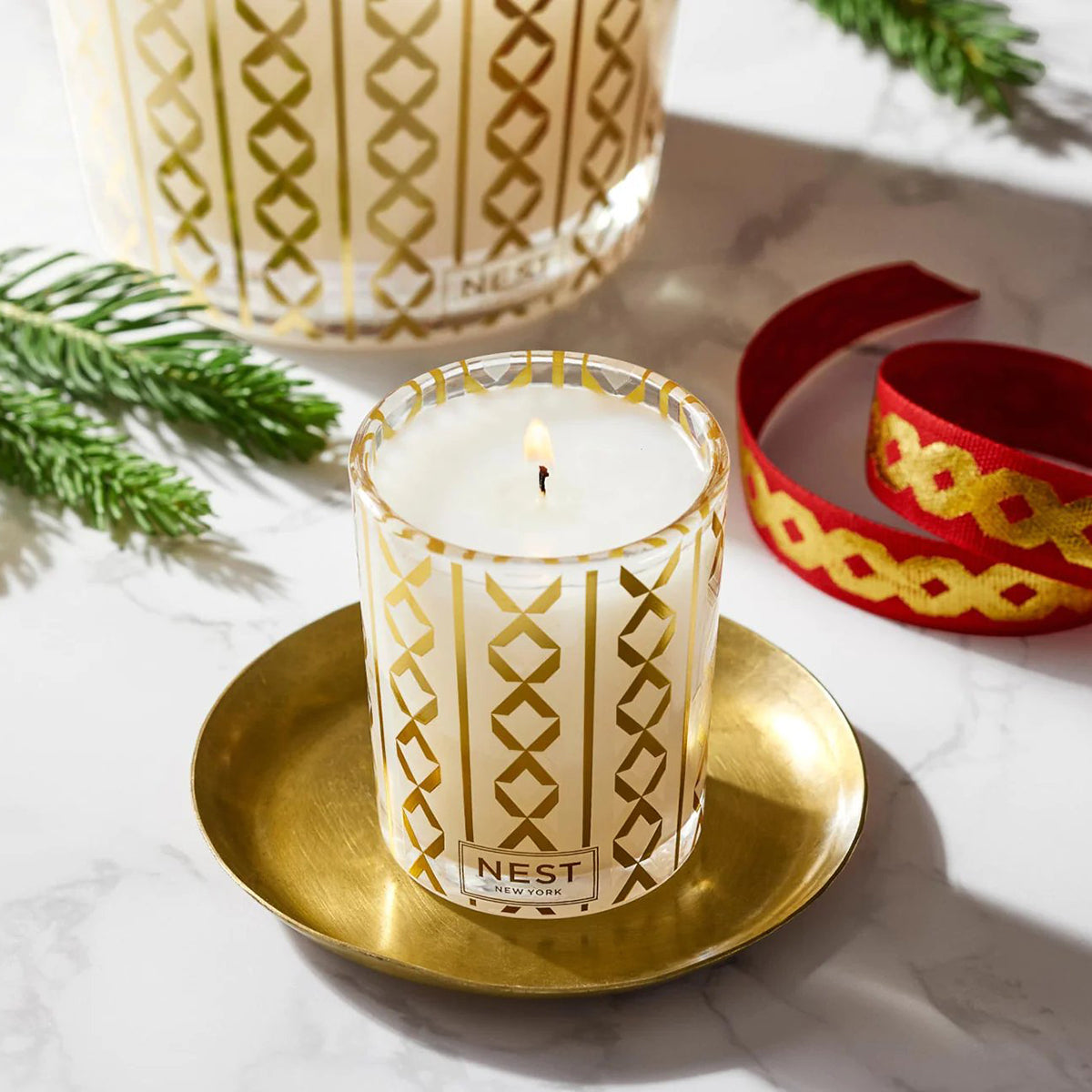 An image of Nest Fragrances Holiday Votive Ornament Candle 2 oz
