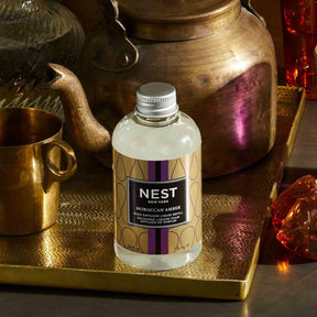 Nest Fragrances Moroccan Amber Reed Diffuser Refill in a room