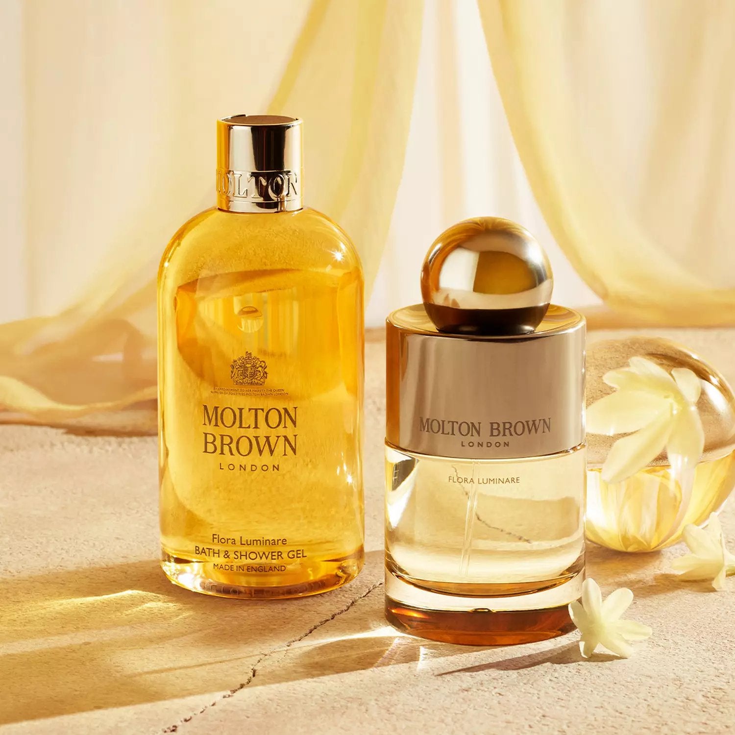 An image of Molton Brown Flora Luminare Bath & Shower Gel 10 fl oz