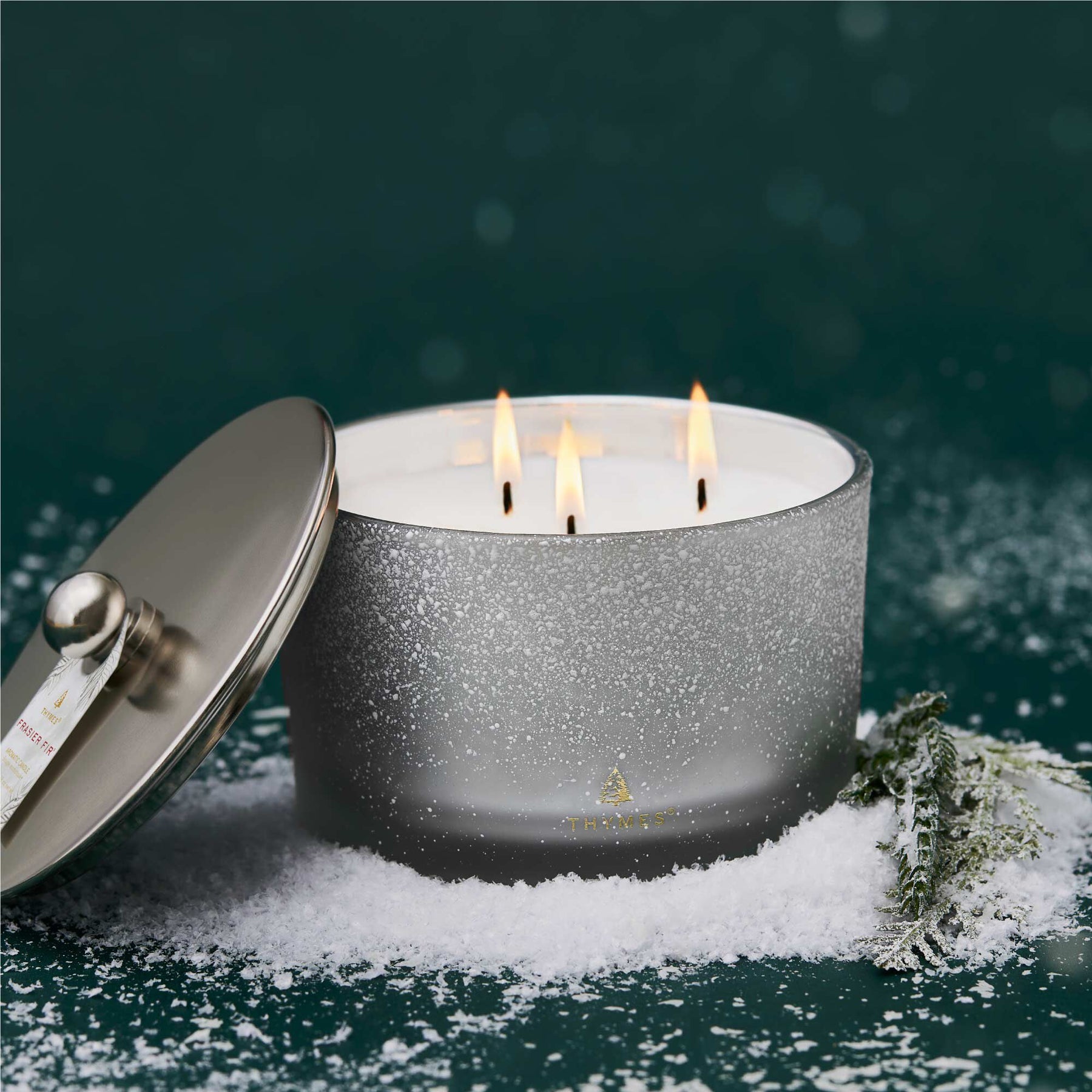 An image of Thymes Frasier Fir Flocked 3-Wick Candle 18 oz