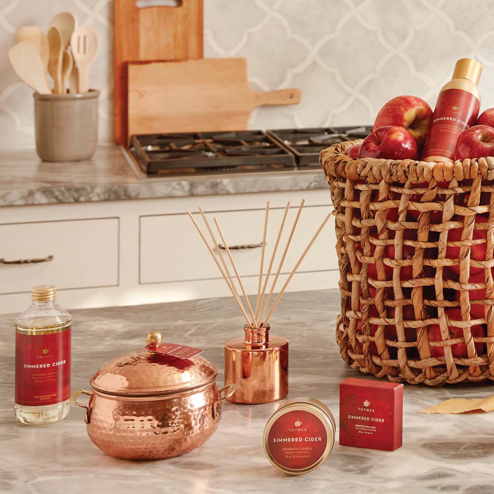 An image of Thymes Simmered Cider Petite Reed Diffuser 4 fl oz