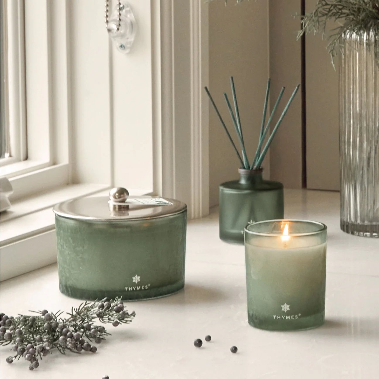 An image of Thymes Highland Frost Large Poured 3 Wick Candle 18 oz