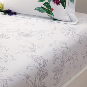 Yves Delorme Parfum Fitted Sheet on a bed