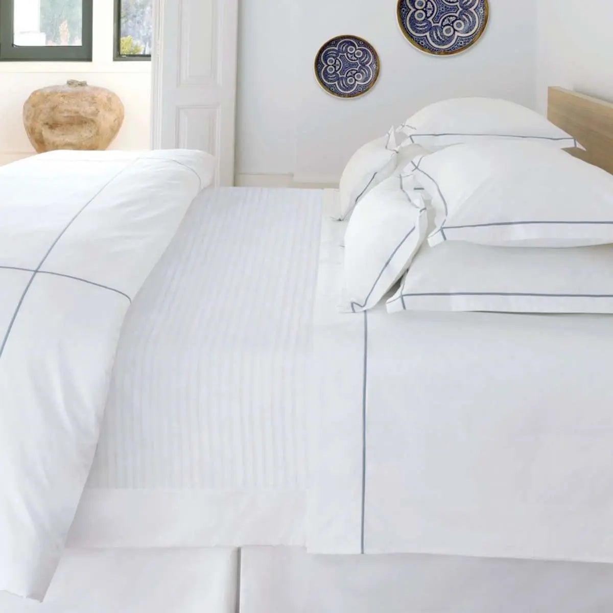 Bovi Classic Hotel White/Blue Bedding Collection in a room