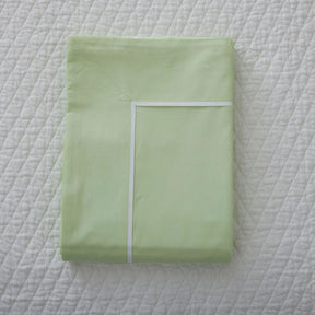 Gracious Home Bali Duvet Cover or Sham - Mint Pastel on a bed