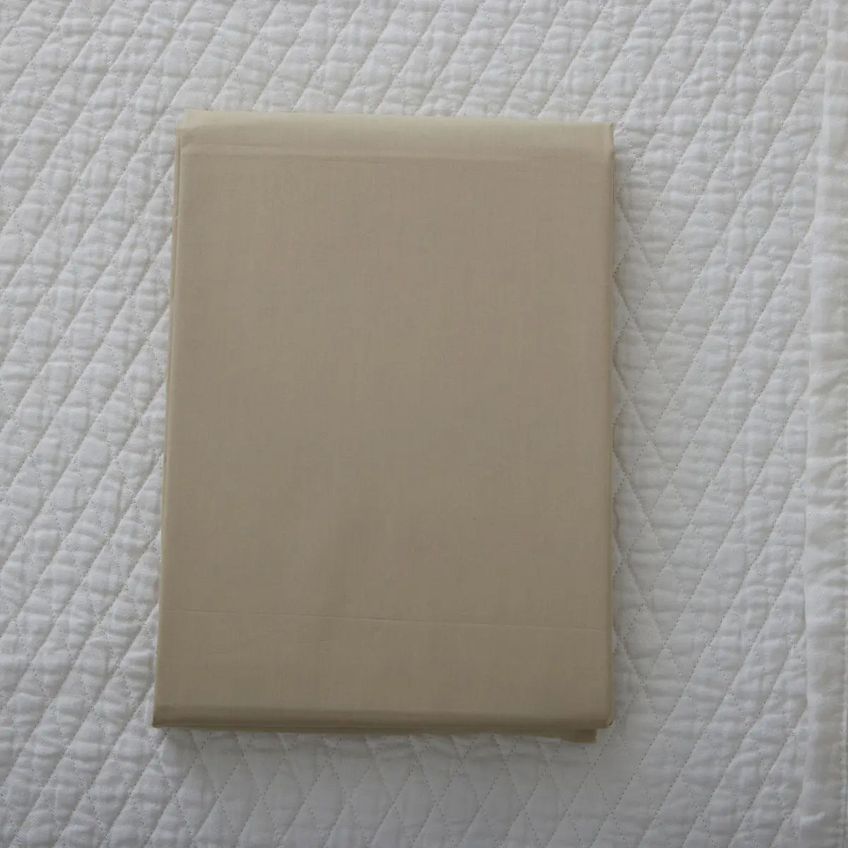 Gracious Home Bali Fitted Sheet in Sand on a bed
