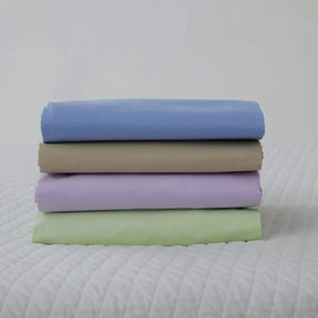 Gracious Home Bali Fitted Sheet in various colors stacked together