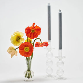 Kim Seybert Bella Clear Candlesticks set with flowers and candles