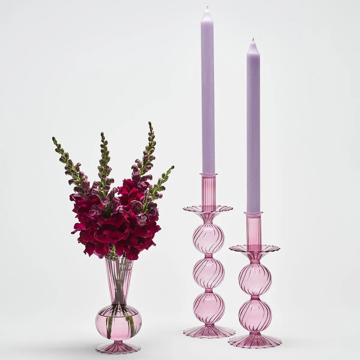 Kim Seybert Bella Lavender Candlesticks set with flowers and candles