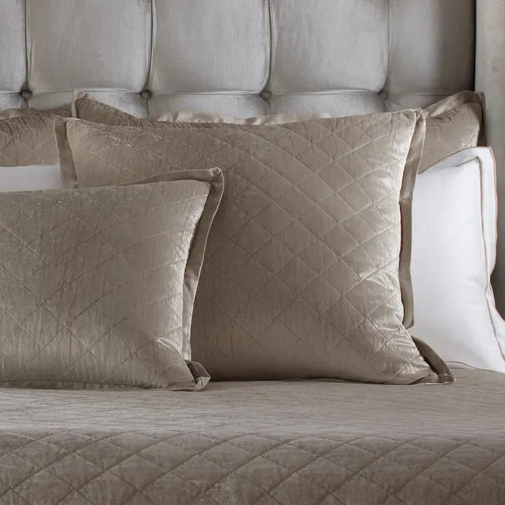Lili Alessandra Chloe Diamond Quilted Pillow Collection in Fawn set on a bed
