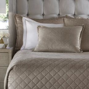 Lili Alessandra Chloe Diamond Quilted Coverlet in Fawn Velvet on a Bed in a room