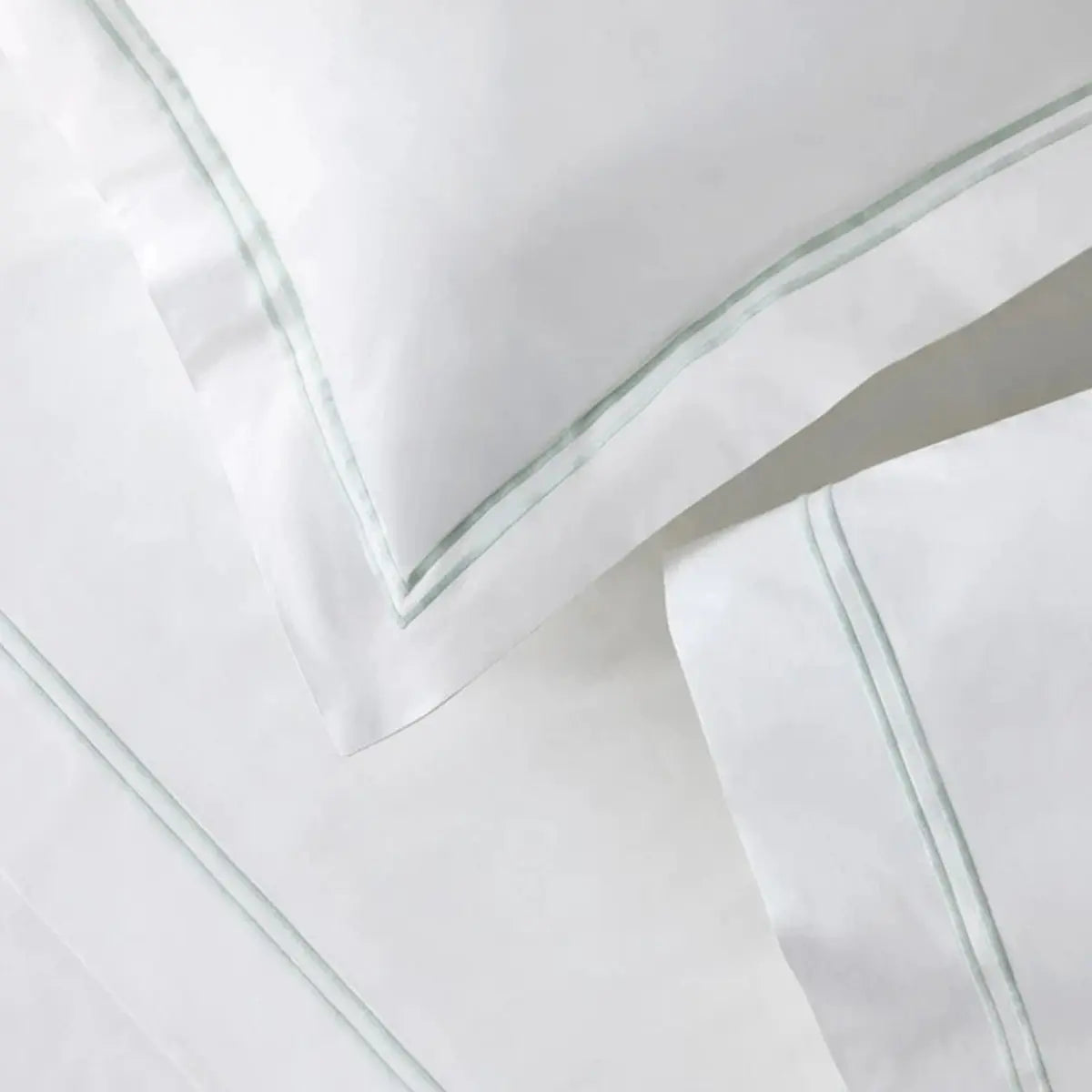 Sferra Grande Hotel Flat Sheet, Sham and Pillowcase on a bed