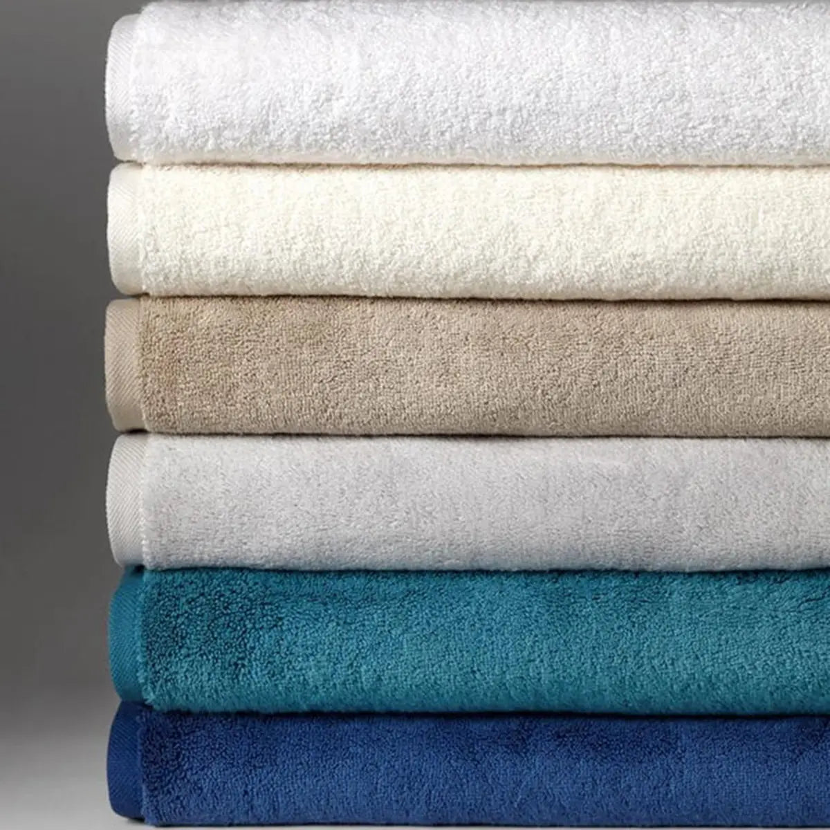 Sferra Sarma Bath Towel in Various Color stacked together