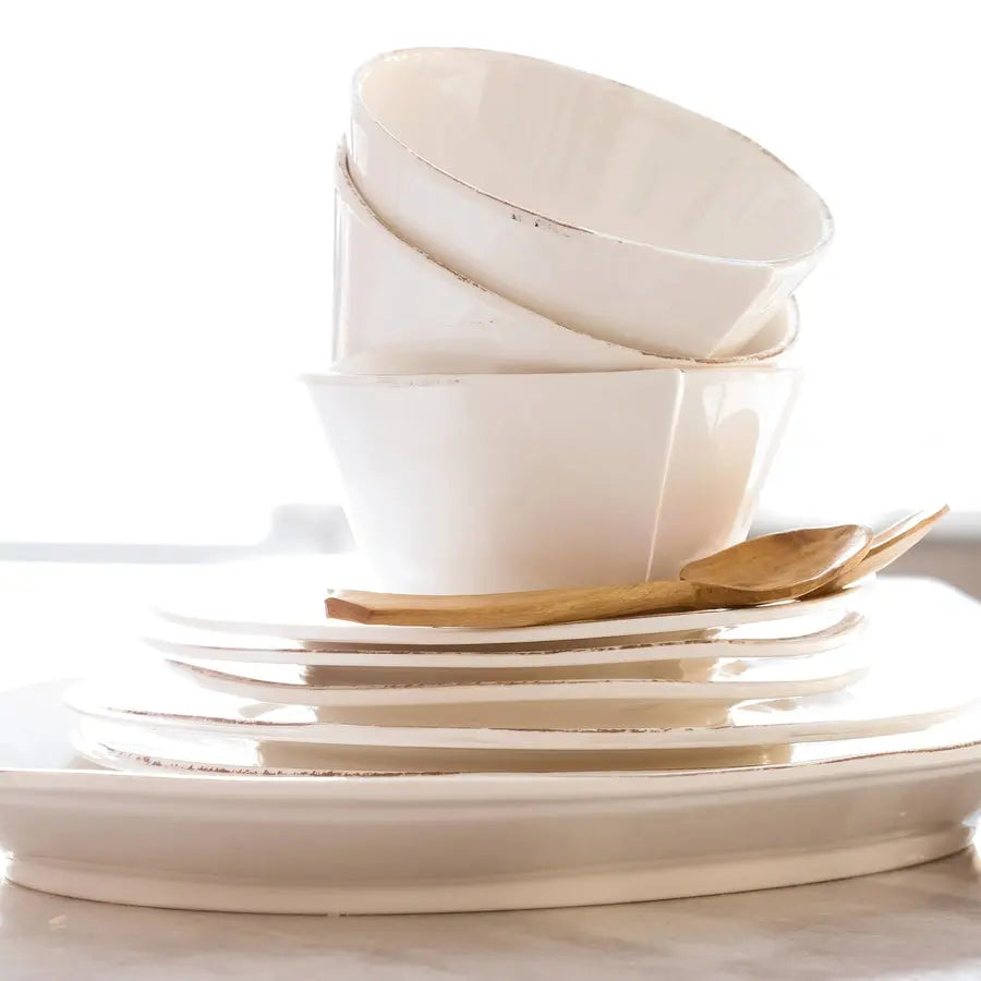 Vietri Lastra Melamine White Oval Platter, Plates and Bowls stacked together