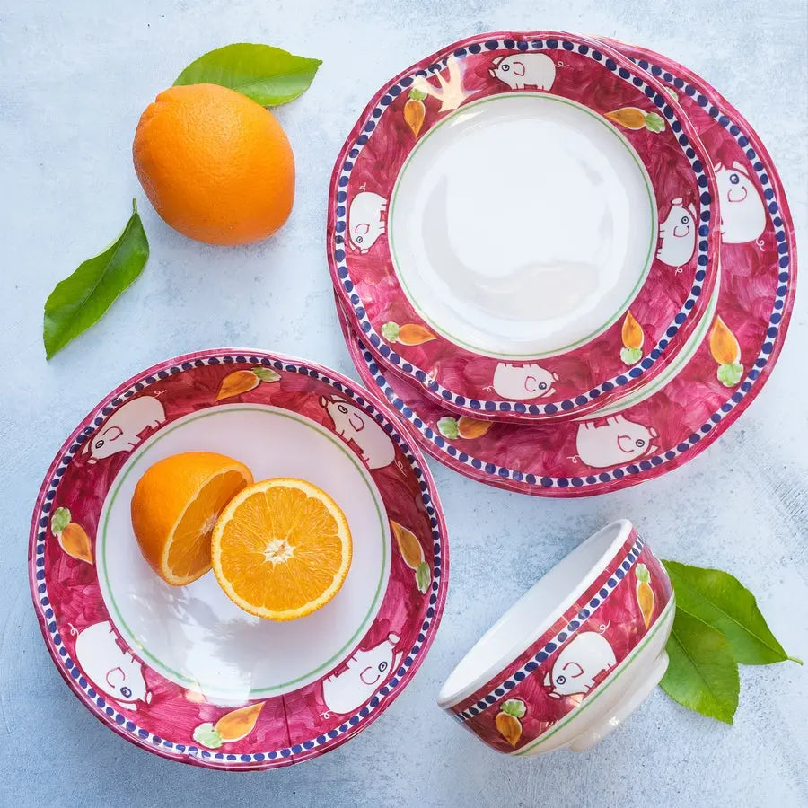 Vietri Campagna Melamine Porco Plates and Bowls with food on a table
