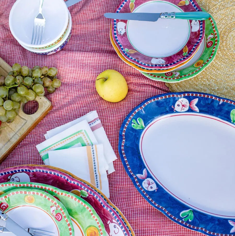 Vietri Campagna Melamine Porco Plates outside with food