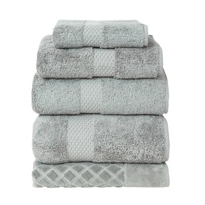 Yves Delorme Etoile Bath Towels and Rug Collection in Platine color stacked together