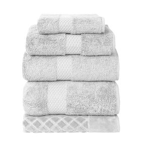 Yves Delorme Etoile Bath Towels and Rug Collection in Silver color stacked together