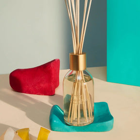 Glasshouse Fragrances Diffuser in a room with home decor items