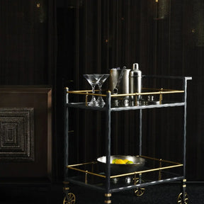 Michael Aram Mirage Ice Bucket and Shaker on a bar cart with glassware and other barware items