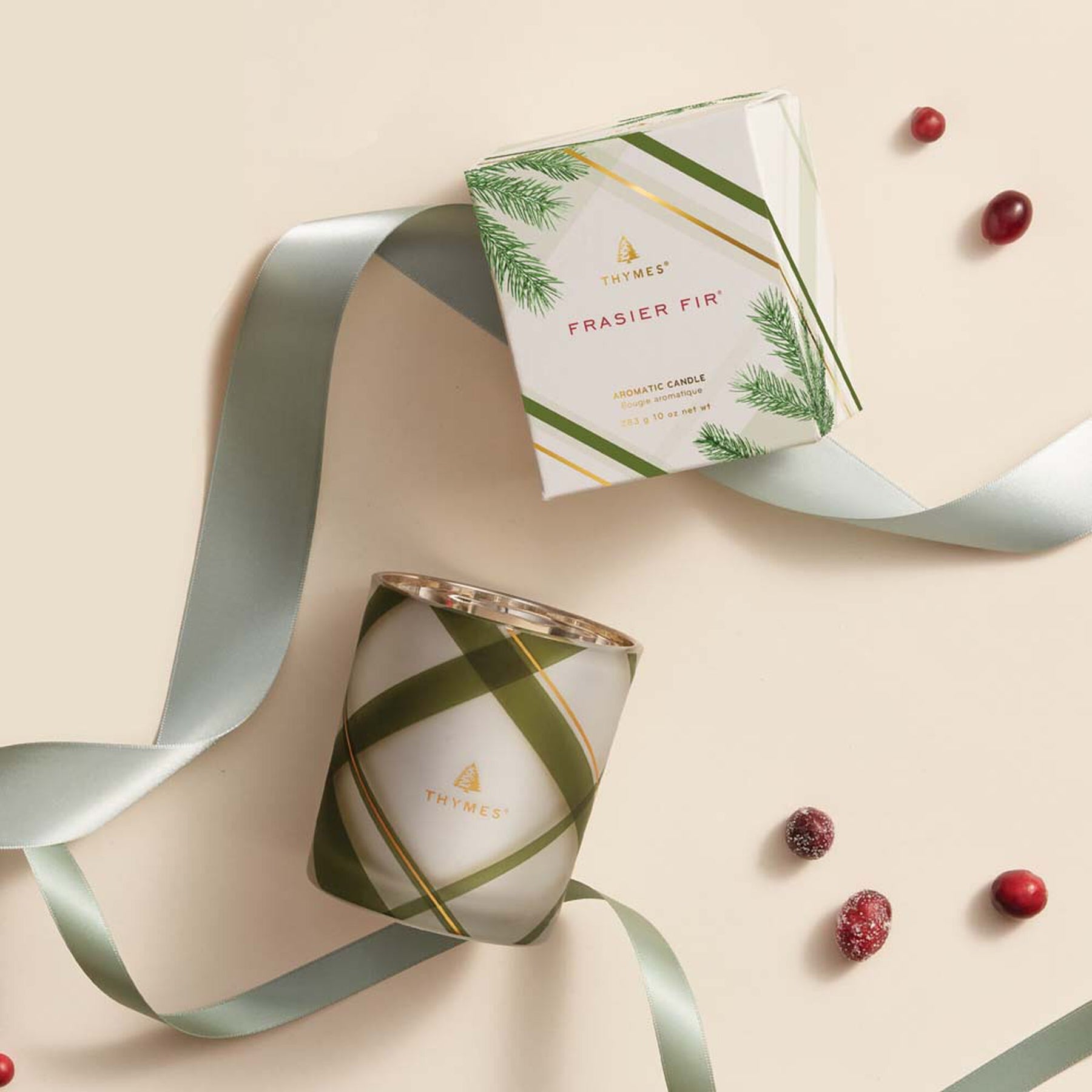 An image of Thymes Fraiser Fir Frosted Plaid Medium Candle 10 oz