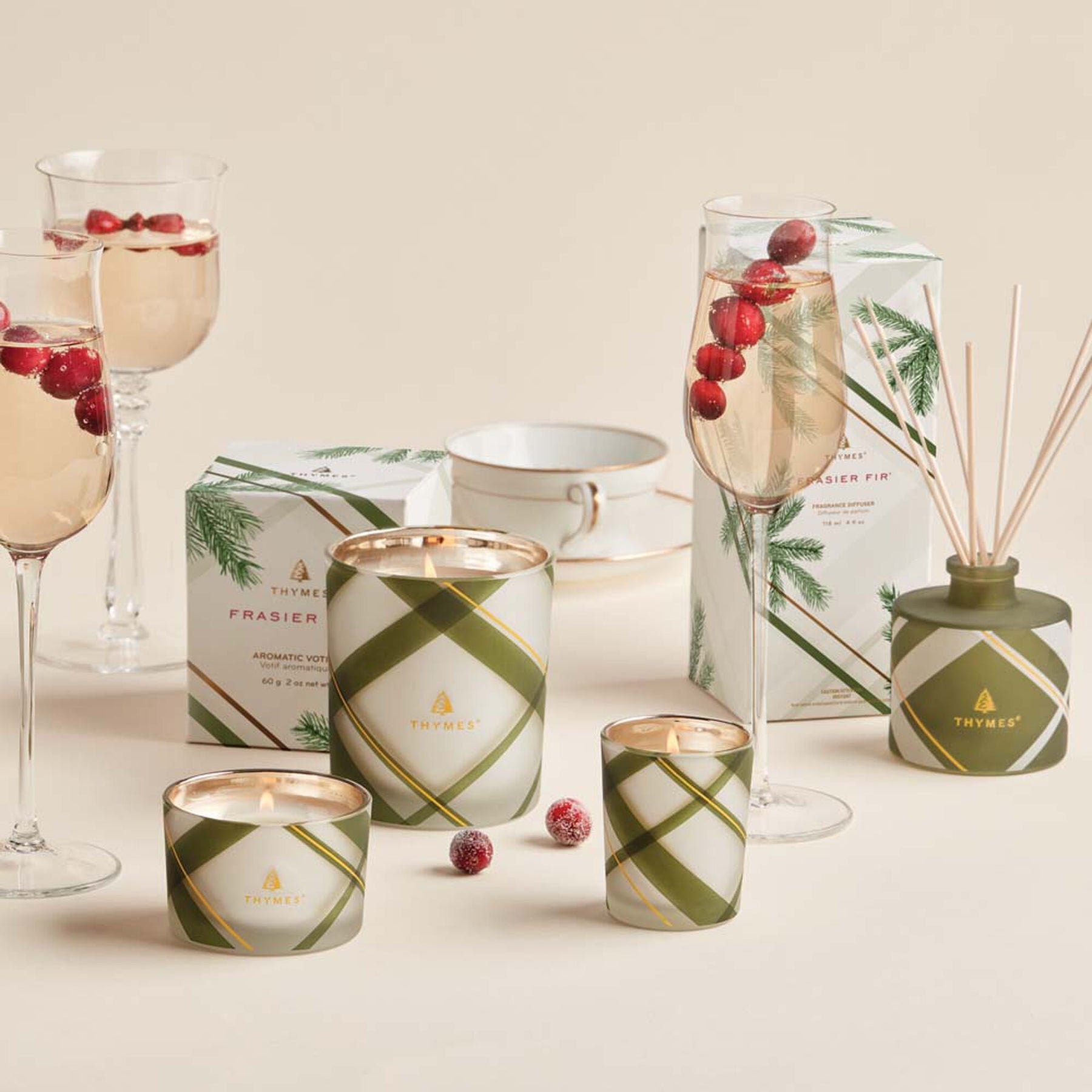 An image of Thymes Fraiser Fir Frosted Plaid Medium Candle 10 oz