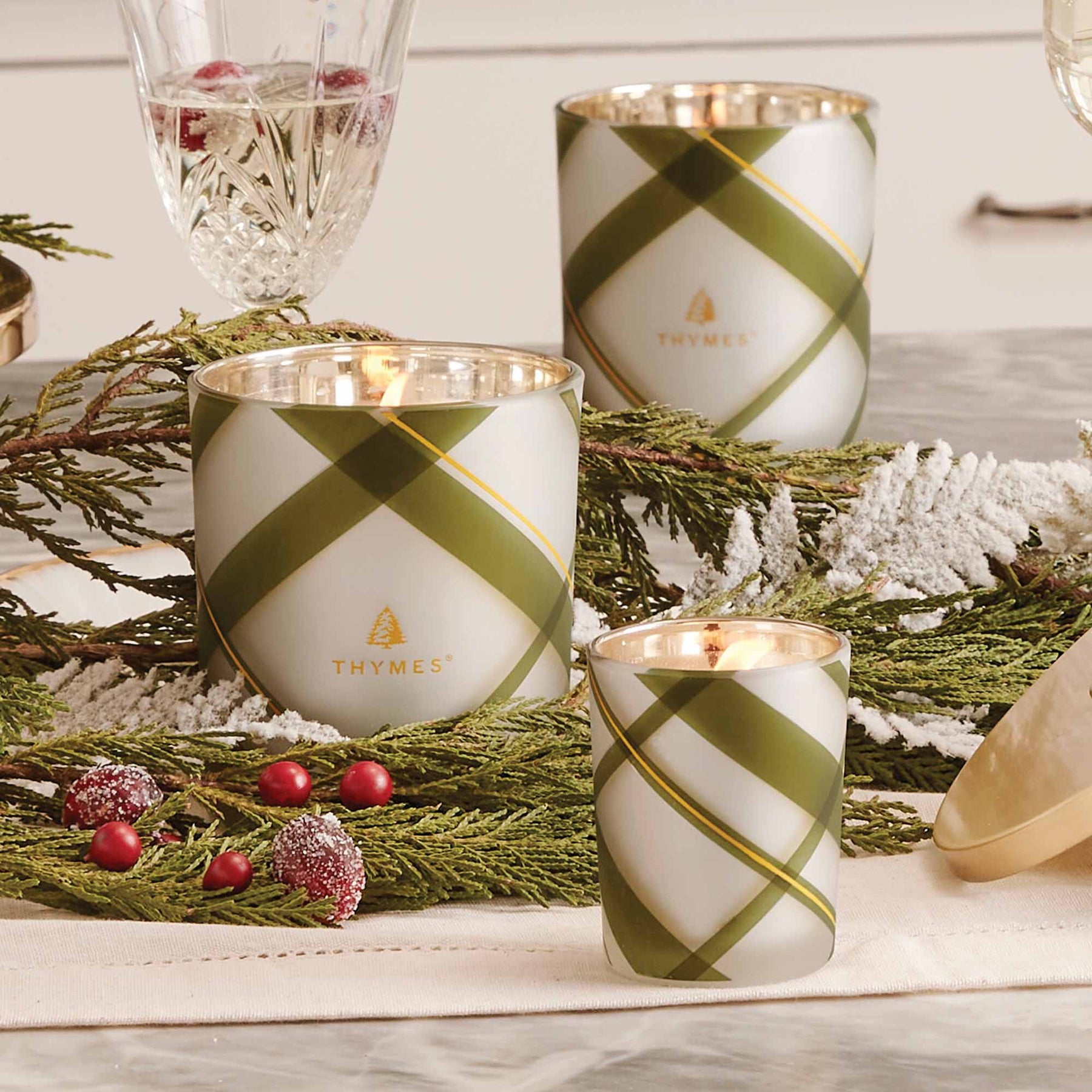 An image of Thymes Fraiser Fir Frosted Plaid Medium Candle 10 oz