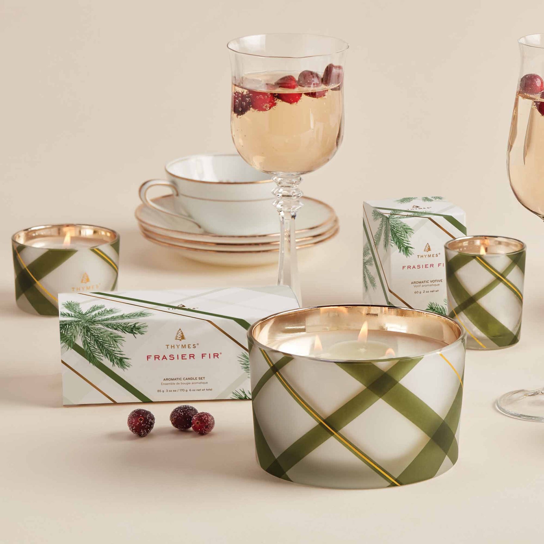 An image of Thymes Fraiser Fir Frosted Plaid Large Candle 18 oz