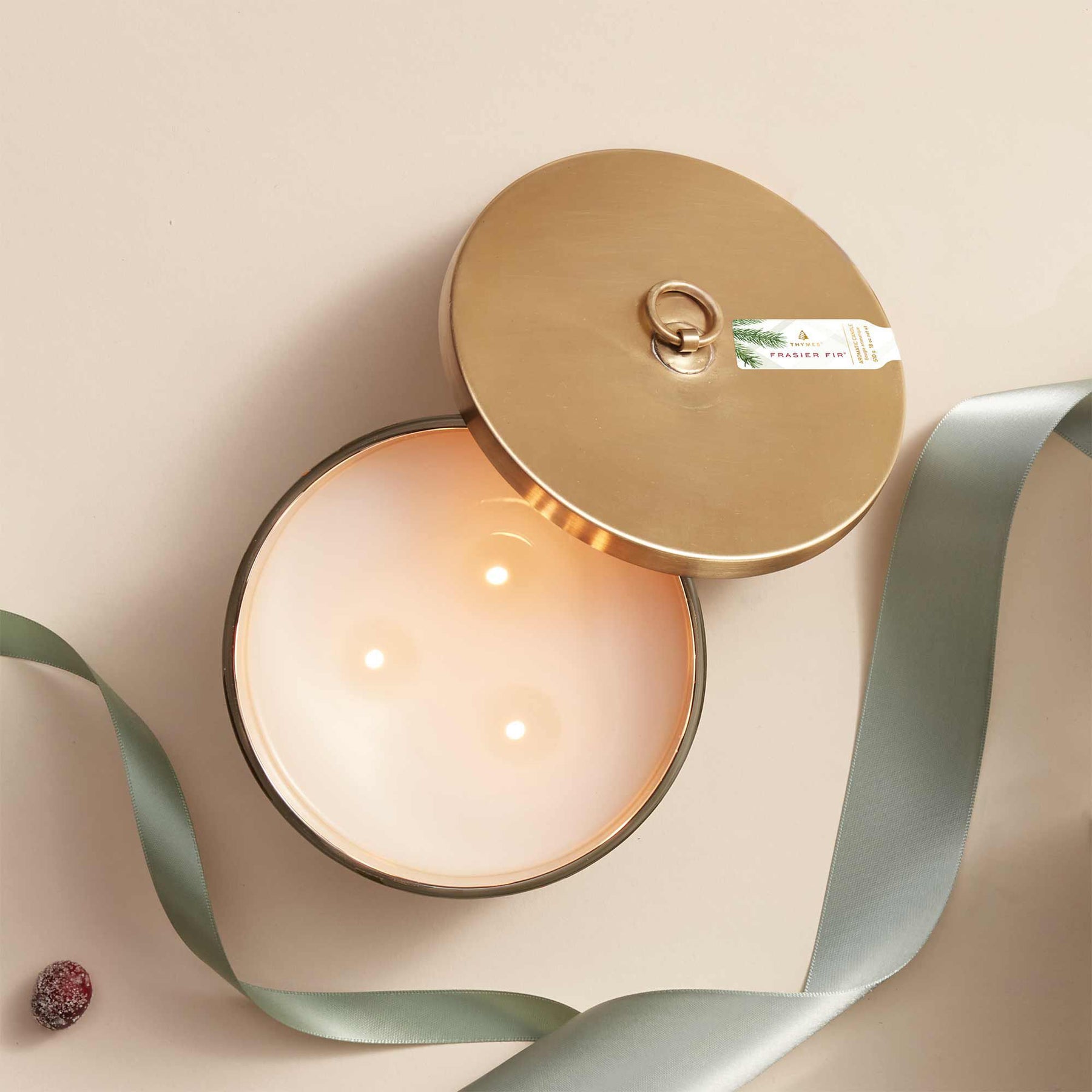 An image of Thymes Fraiser Fir Frosted Plaid Large Candle 18 oz