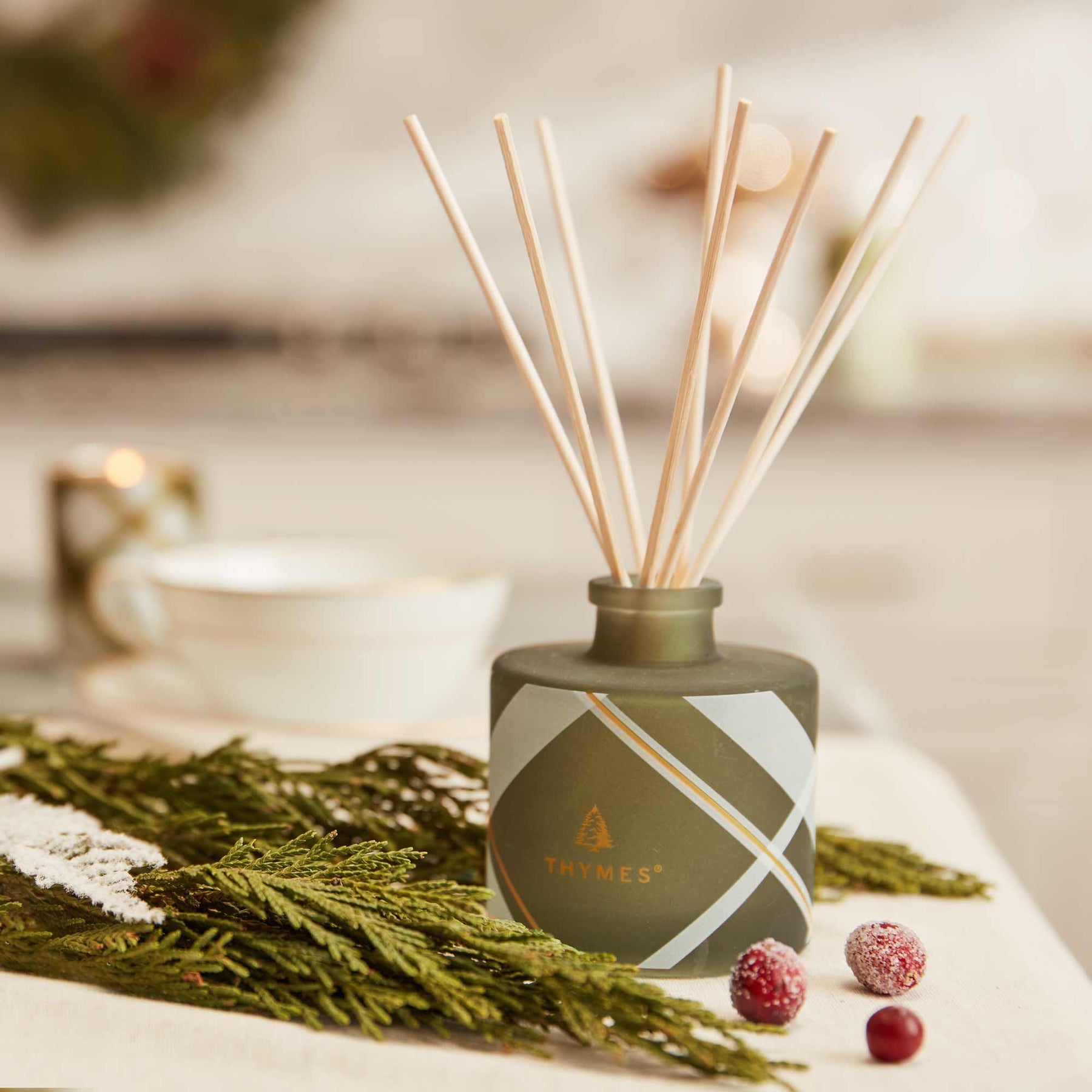 An image of Thymes Fraiser Fir Frosted Plaid Petite Reed Diffuser 4 fl oz