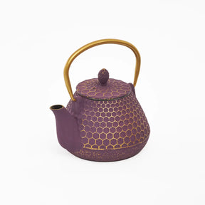 Purple teapot with gold handle